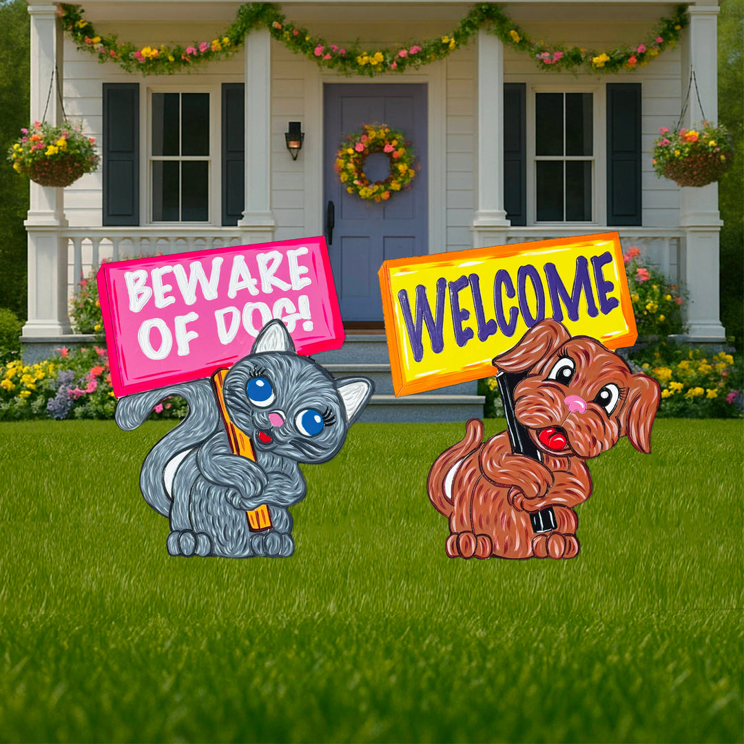 Funny animal yard art signs for lawns, gardens, walkways, and porches. 1 sign is a cute, funny kitten holding a "Beware of Dog" sign and the other decorative yard art sign is of a brown dog holding a welcome sign. Both outdoor yard art signs come with stakes for easy mounting and placement.