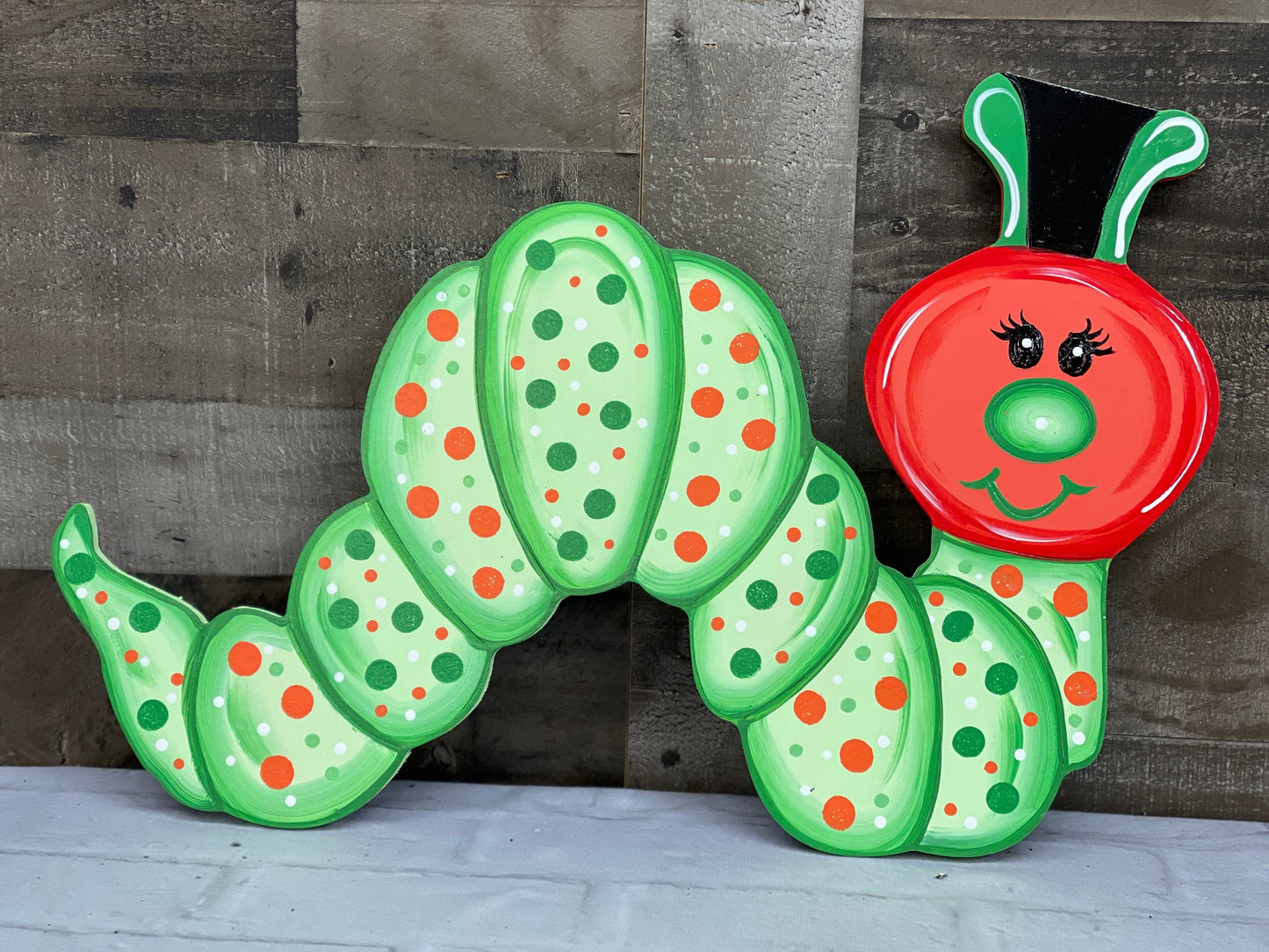 inch worm yard art decoration