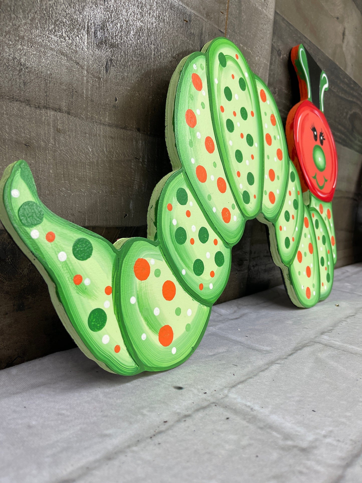 inch worm yard art decoration