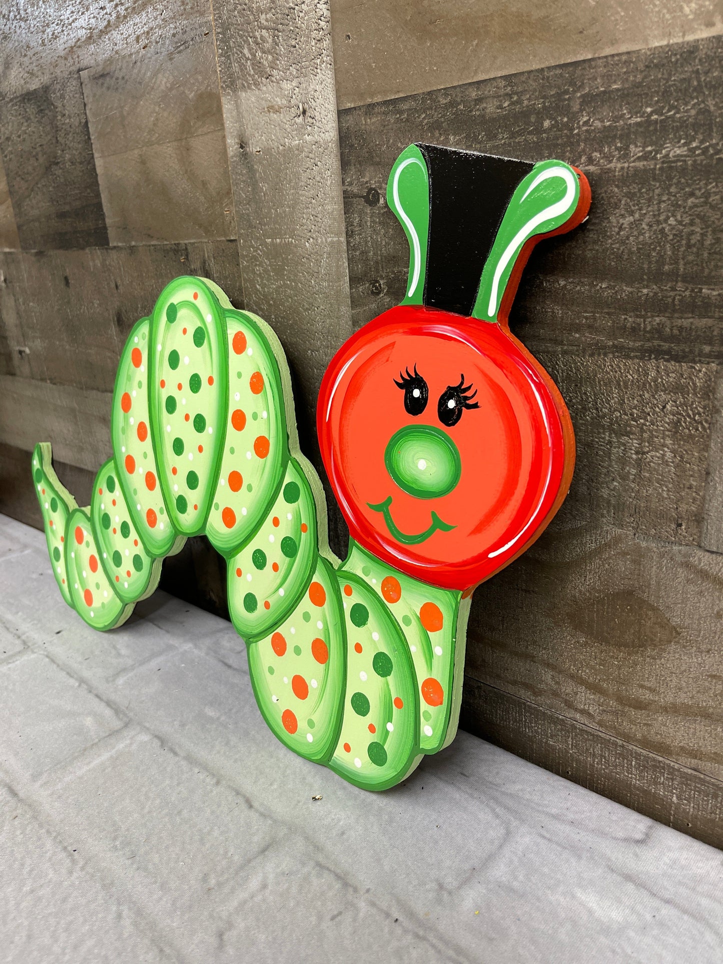 inch worm yard art decoration