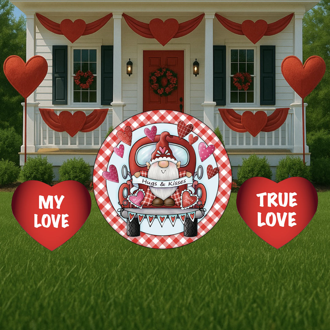 Valentine's Day Yard & Lawn Decorations. Featuring 3 V-day yard signs. 1 red and white garden gnome sign with hearts along with 2 heart shaped yard signs with stakes saying my love and true love.