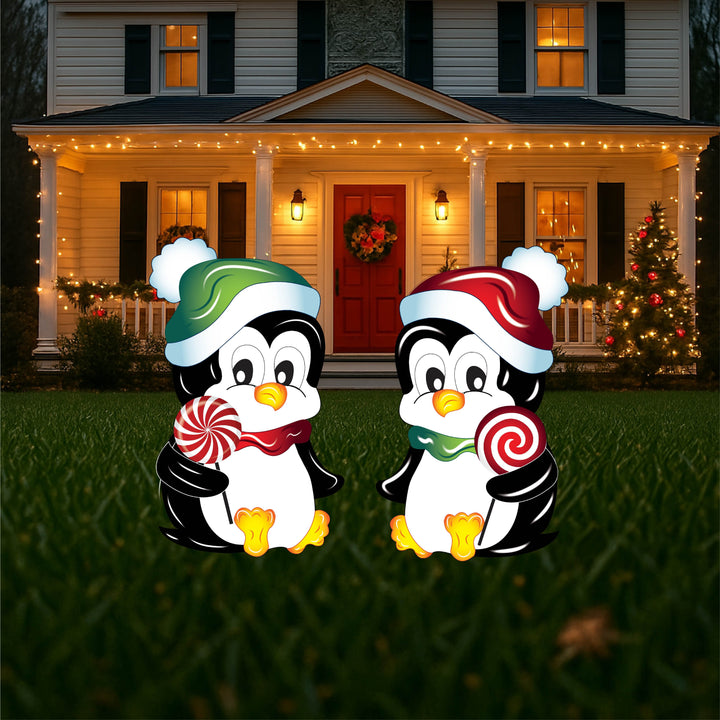 Christmas Penguin with a green stocking hat and peppermint