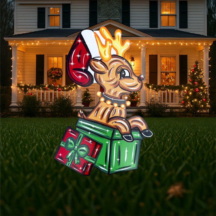 Christmas Reindeer Sits in a Gift Box with a Stocking Outdoor Decoration