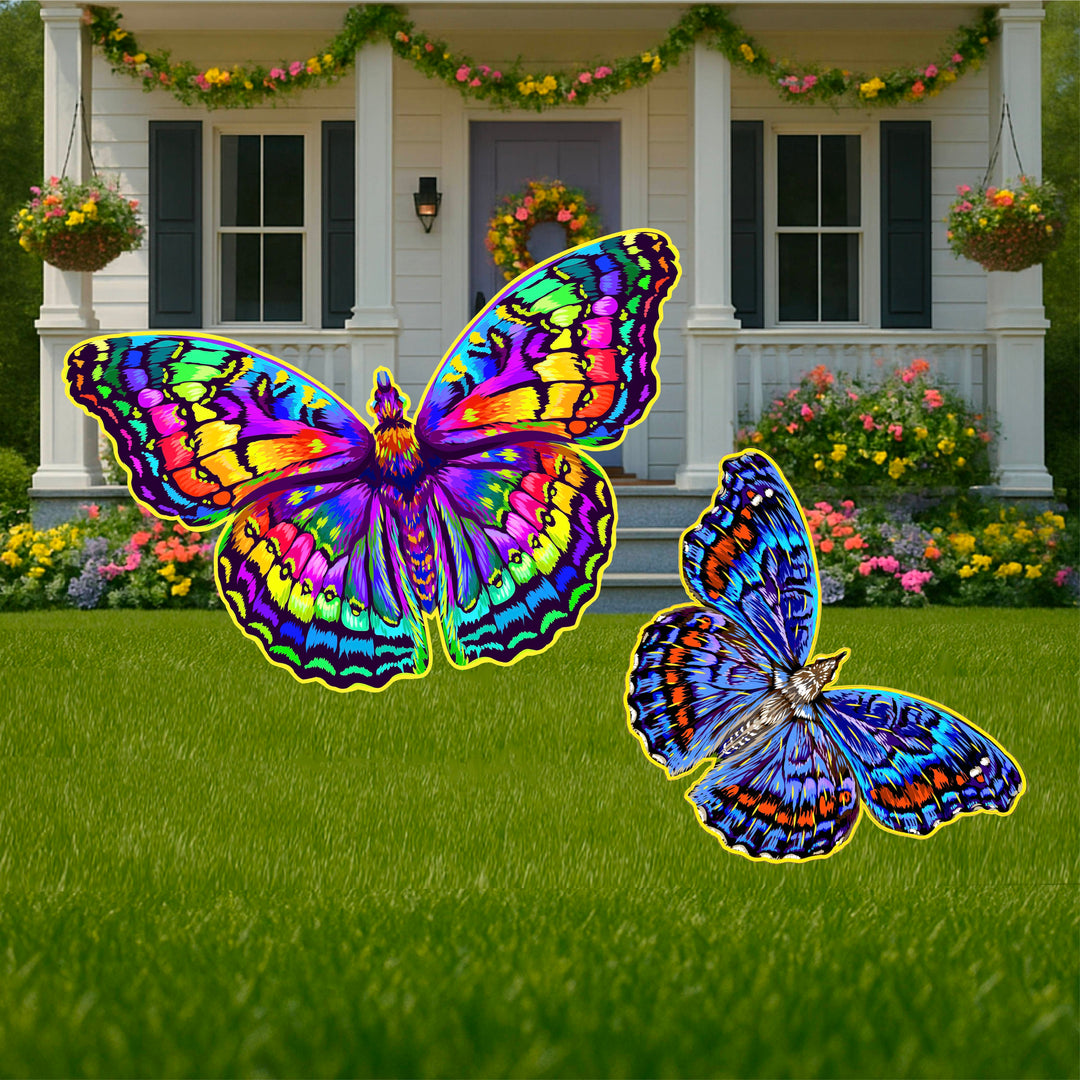 Set of 2 beautiful, brightly colored butterfly yard art signs. One butterfly is in bright, neon type colors, while the other is shades of blue with some orange and white. These decorative outdoor yard pieces will surely add a bright pop to any lawn, garden, or flowerbed path. Perfect yard decor for spring and summer. 