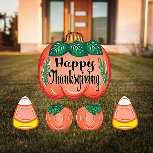 Happy Thanksgiving Yard Sign with Fall Pumpkins and Candy Corns Outdoor Scene