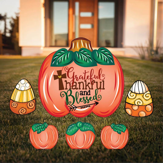Grateful Thankful Blessed with Cross Yard Sign with Fall Pumpkins and Candy Corns Outdoor Scene