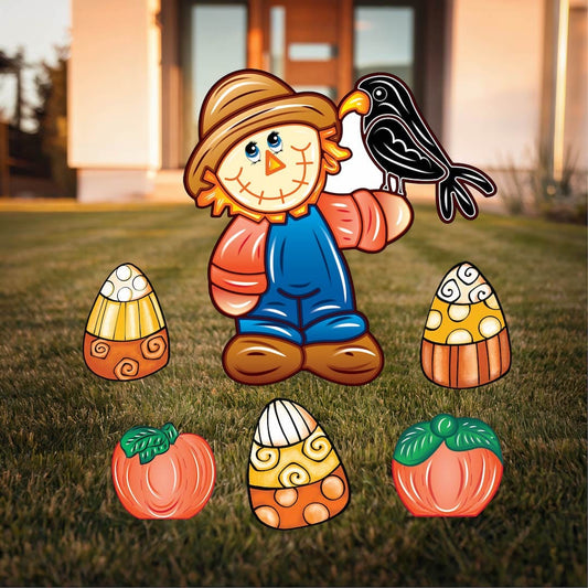 Scarecrow with a crow and Fall pumpkins with Candy corns Halloween yard art