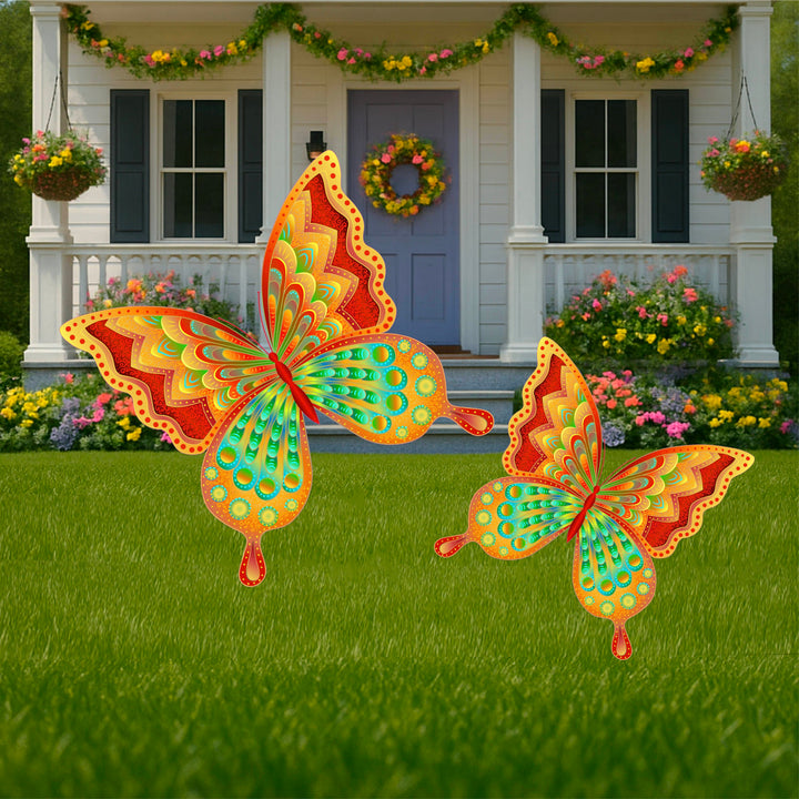 Beautiful set of 2 orange, red and teal butterfly yard art signs with stakes. These pretty animal and insect lawn decor will brighten up any spring or summer lawn. Buy butteryfly yard decorations at Yard Art Decor and More. Made in the USA. 