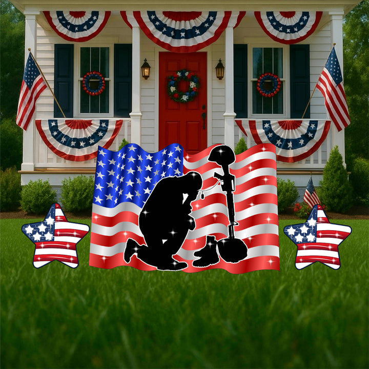 Military Tribute Yard Sign Decoration of a kneeling soldier with head down in front of American Flag. 