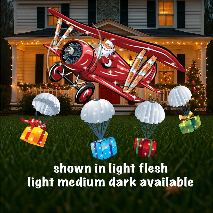 Santa in Air Plane with parachute presents