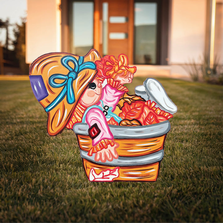 Fall Scarecrow Sits in a Bucket