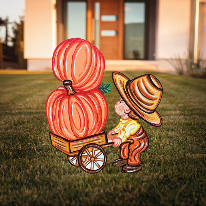 Fall Boy Pushes a Pumpkin Cart Yard Art Decorations