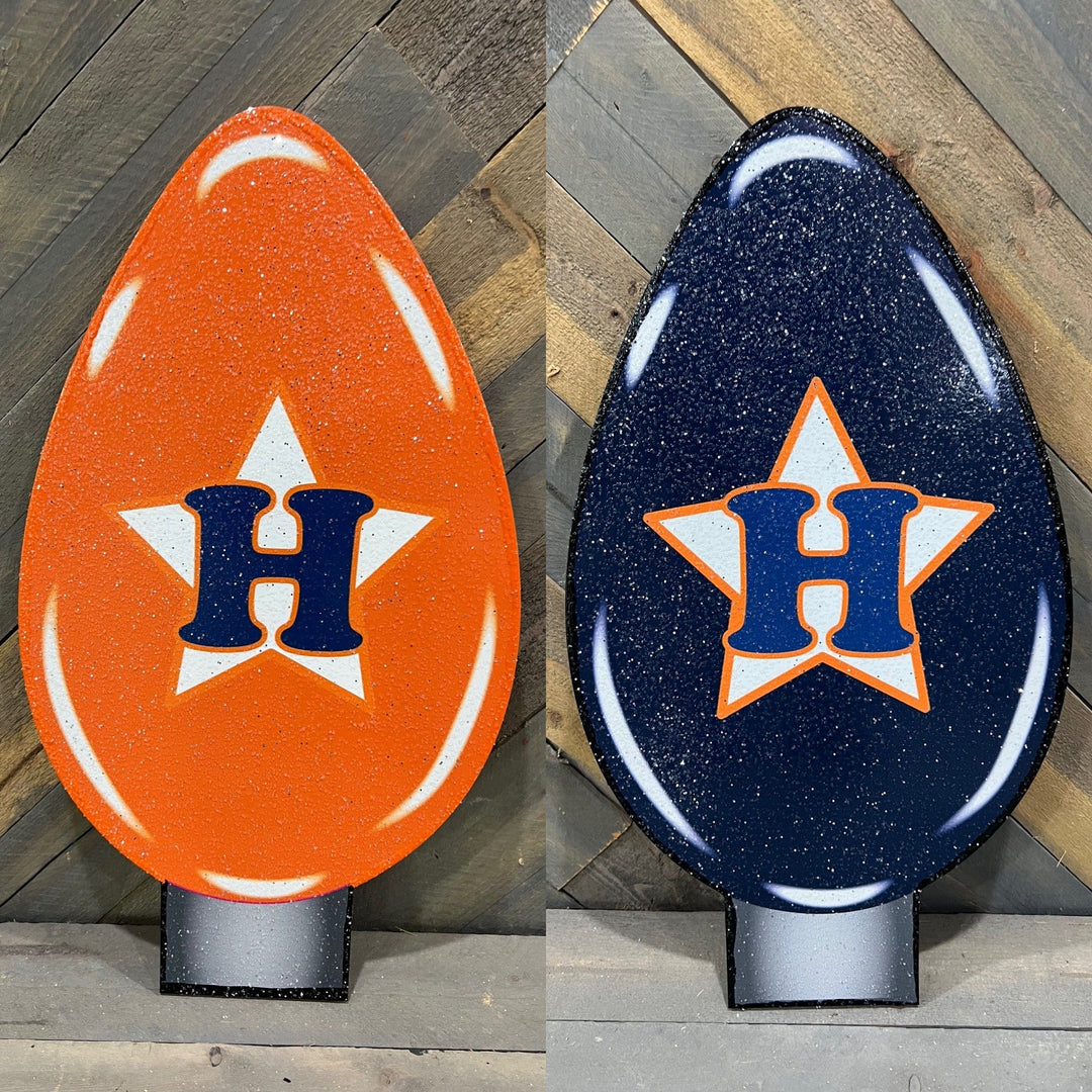 Houston Baseball Santa Yard Art with candy canes and bulbs