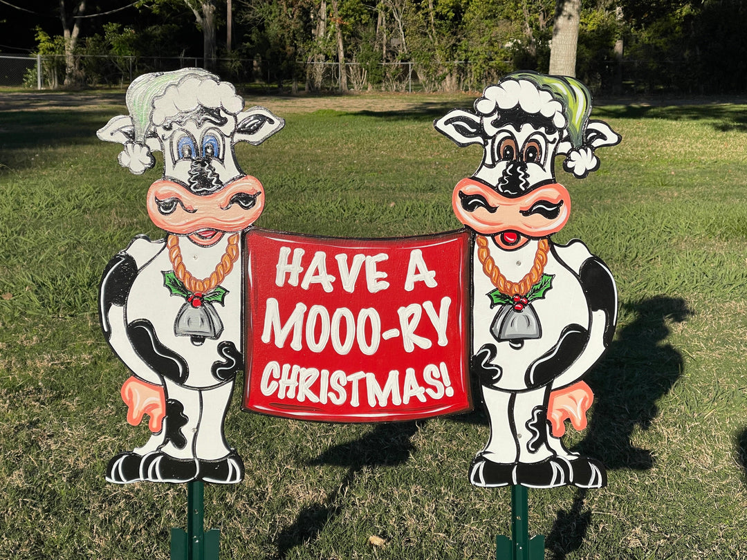 Happy Christmas Cows with a Have A Mooory Christmas Sign Yard Art Decoration