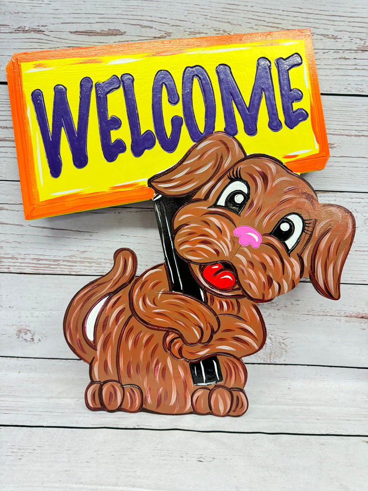 Cute Dog Holding a Welcome Yard Art Sign