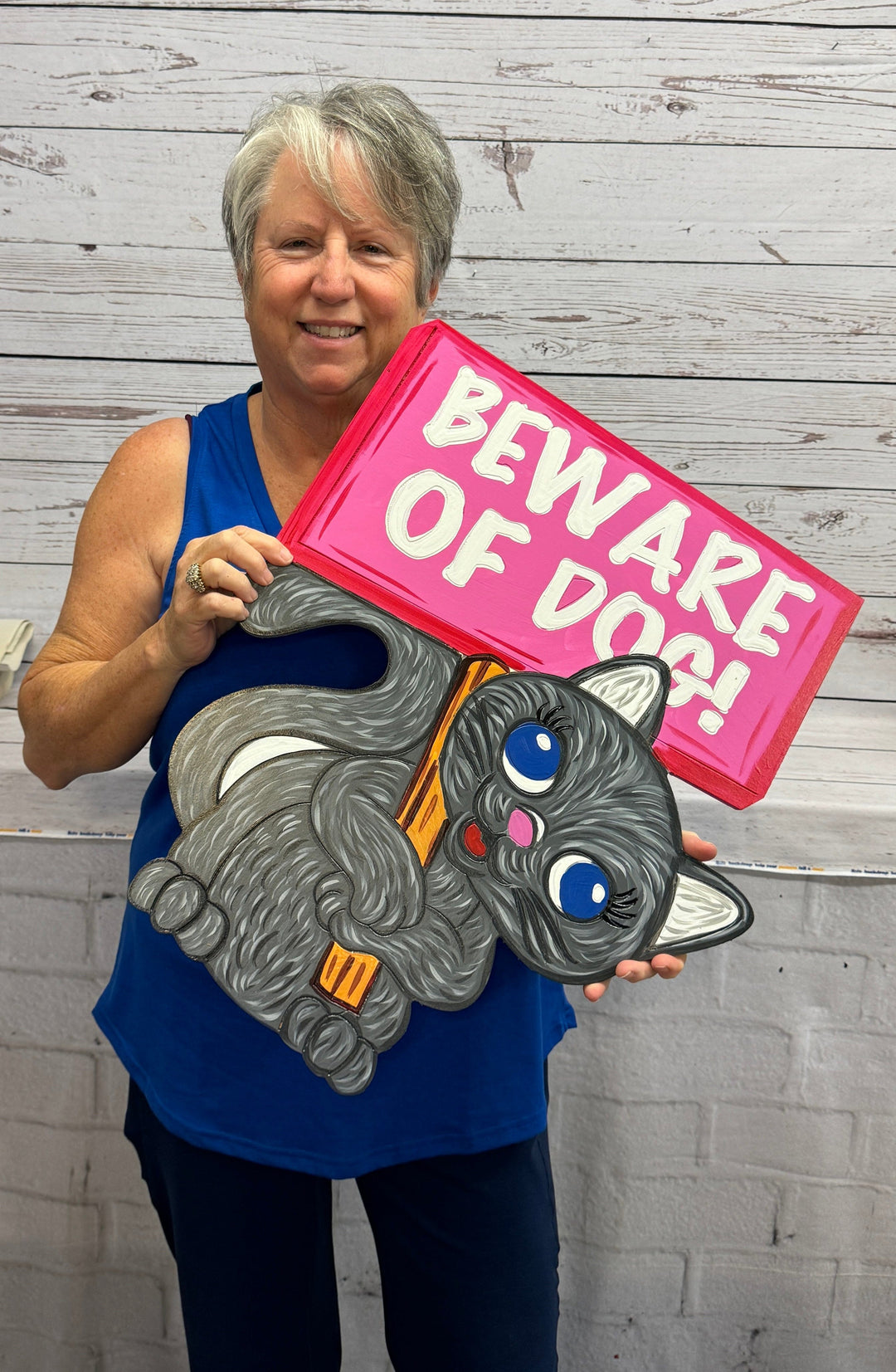 Kitty Holding a Beware of Dog Yard Art Sign