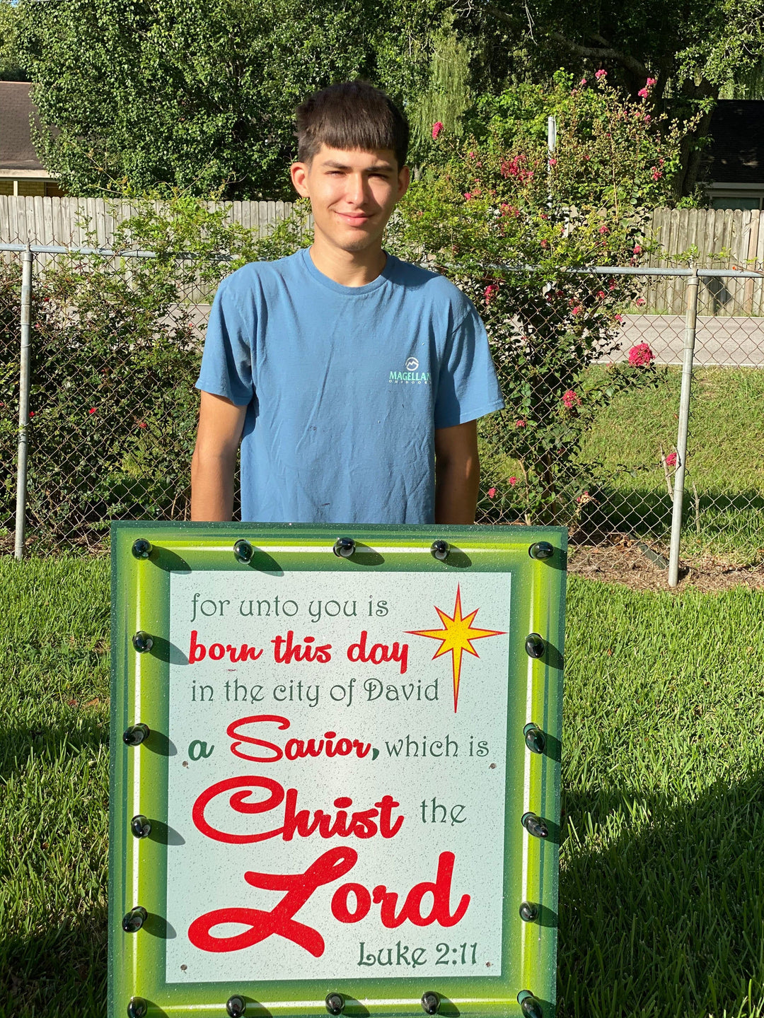 Lighted Luke 2:11 sign with red border Christmas yard art