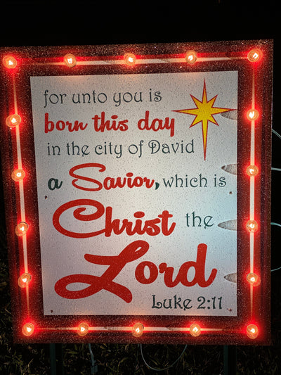 Lighted Luke 2:11 sign with red border Christmas yard art