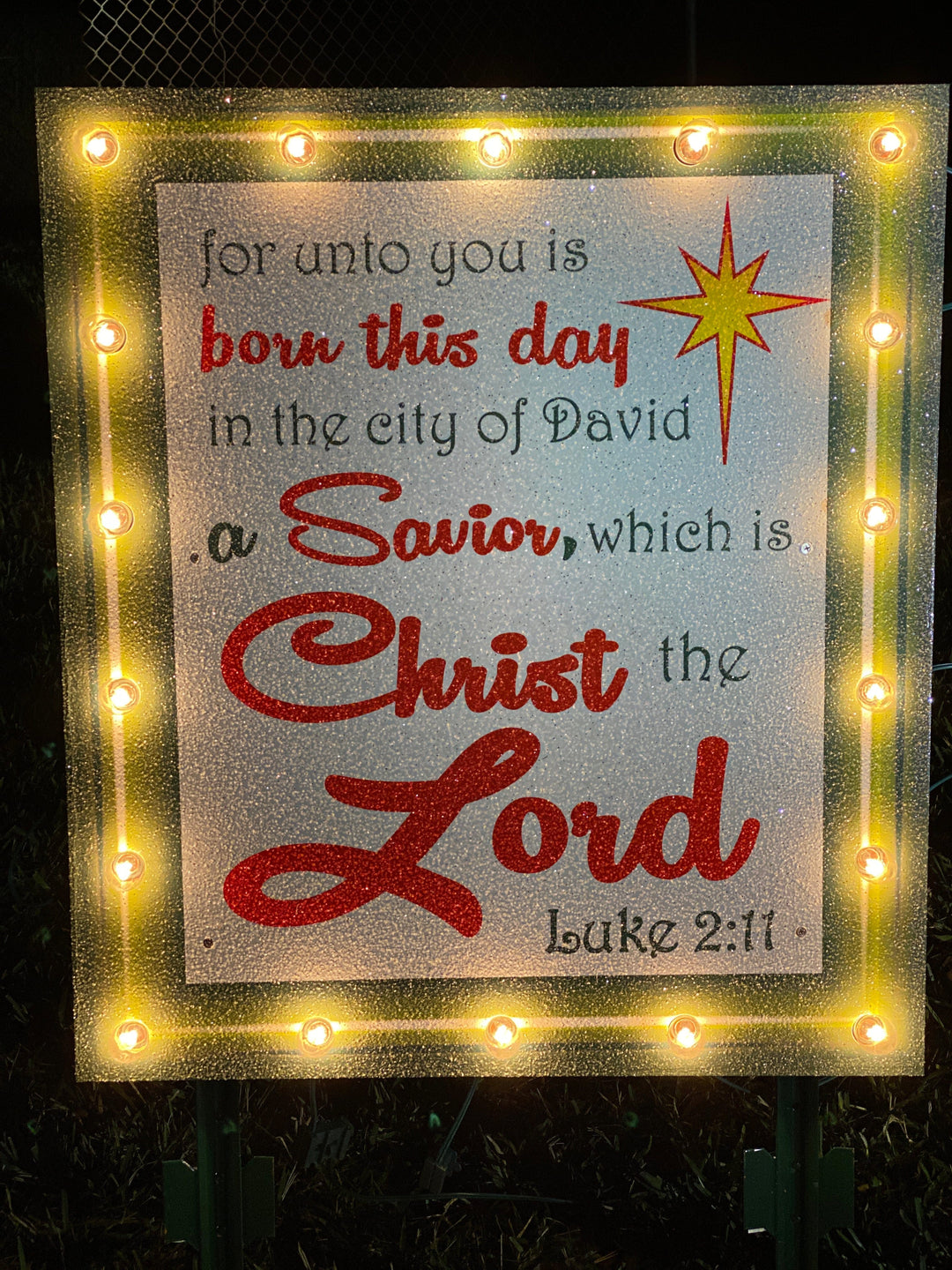 Lighted Luke 2:11 sign with red border Christmas yard art