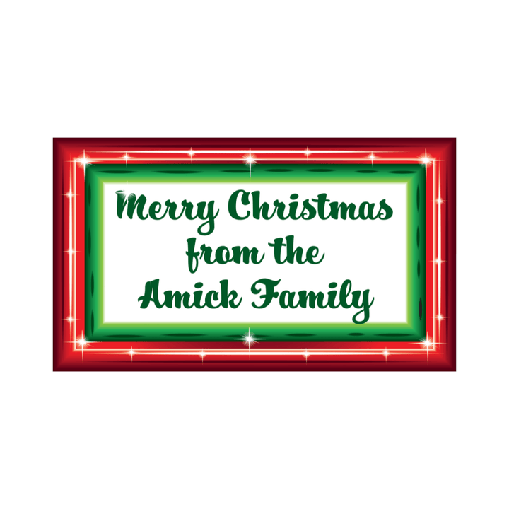 Customizable holiday yard art mockup showing a decorative red and green frame with green family greeting text.