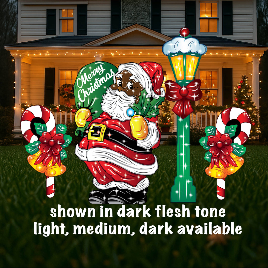 Outdoor Christmas Holiday Yard Signs featuring a santa in a dark flesh tone, a street lamp in green with yellow lighting, 2 candy canes with bells and Misletoe tied around them. Decorate your lawn this Christmas with hand crafted outdoor lawn signs with stakes. 