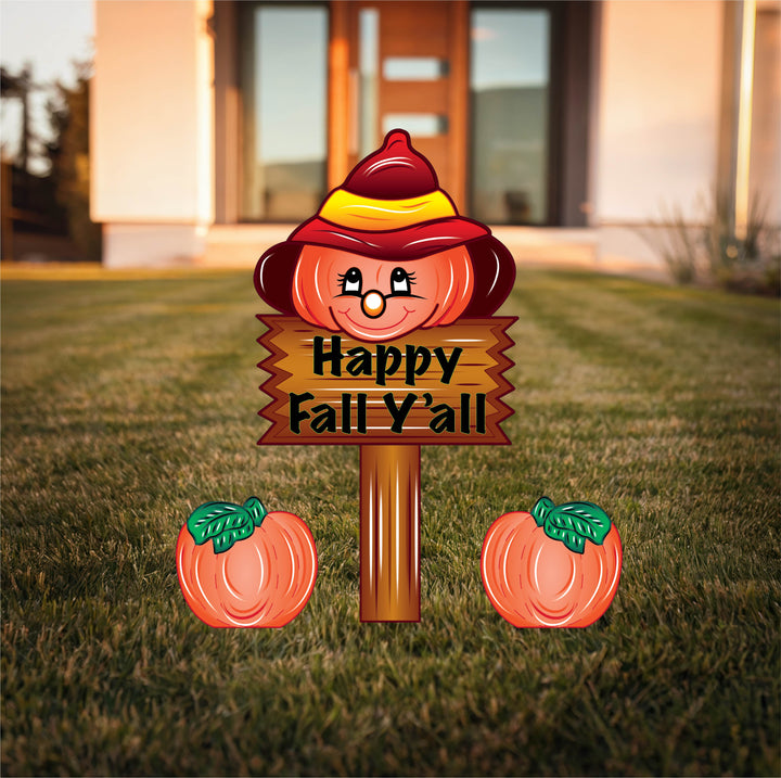 Happy Fall Y’all yard sign featuring a smiling pumpkin with two mini pumpkins – festive autumn outdoor lawn decor.