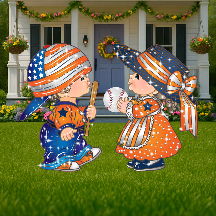 Patriotic kids baseball yard sign featuring a boy with a baseball bat and a girl holding a baseball. These outdoor summer yard art signs are perfect lawn and garden decorations for spring and summer.  