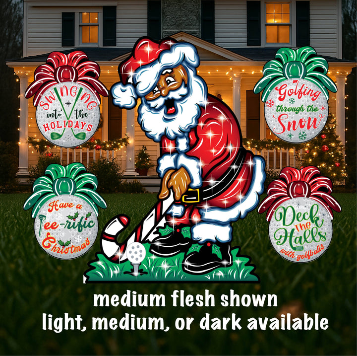 A yard art sign featuring an illustration of Santa Claus golfing, with the text 'Golfing Santa' and Christmas-themed phrases, set against a nighttime backdrop with a lit house in the background.