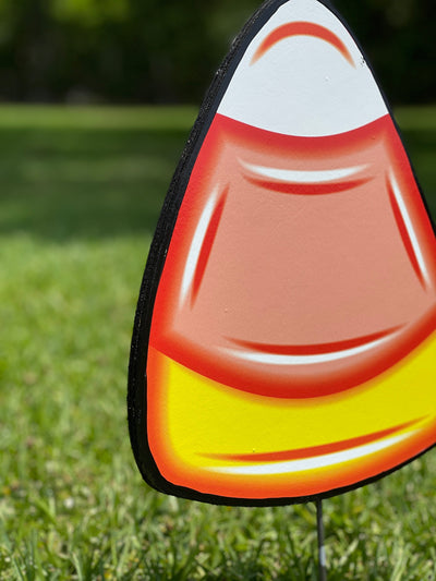 candy corn painted yard art design