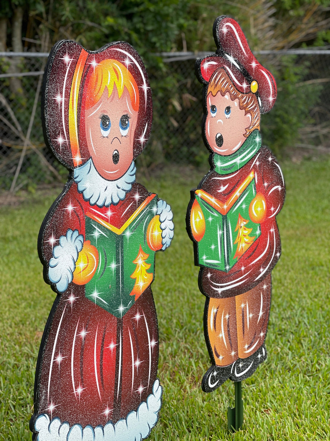 Set of Girl and Boy Caroling