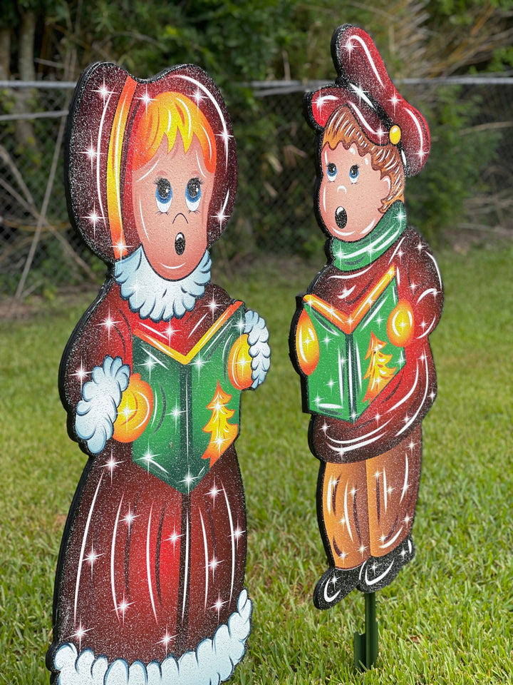 Set of Girl and Boy Caroling