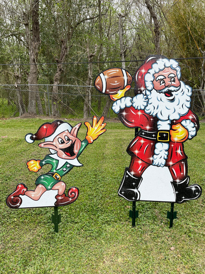 Santa Claus plays Football with Elves Yard Decoration