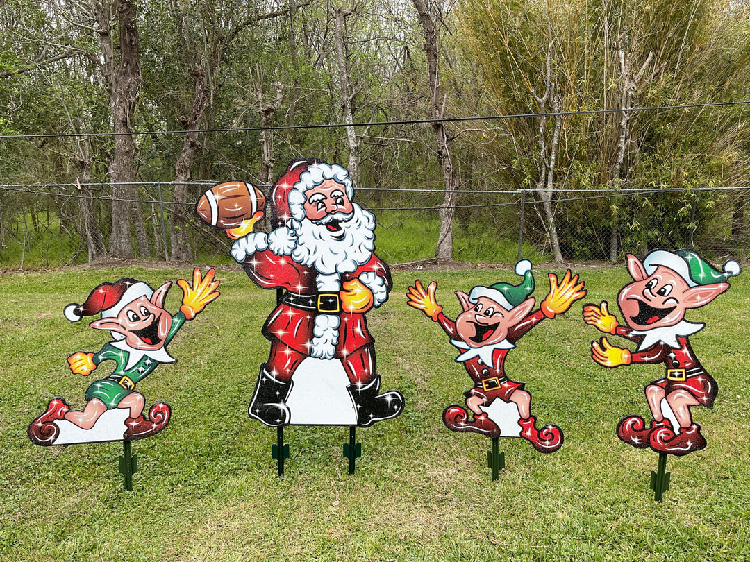 Santa Claus plays Football with Elves Yard Decoration
