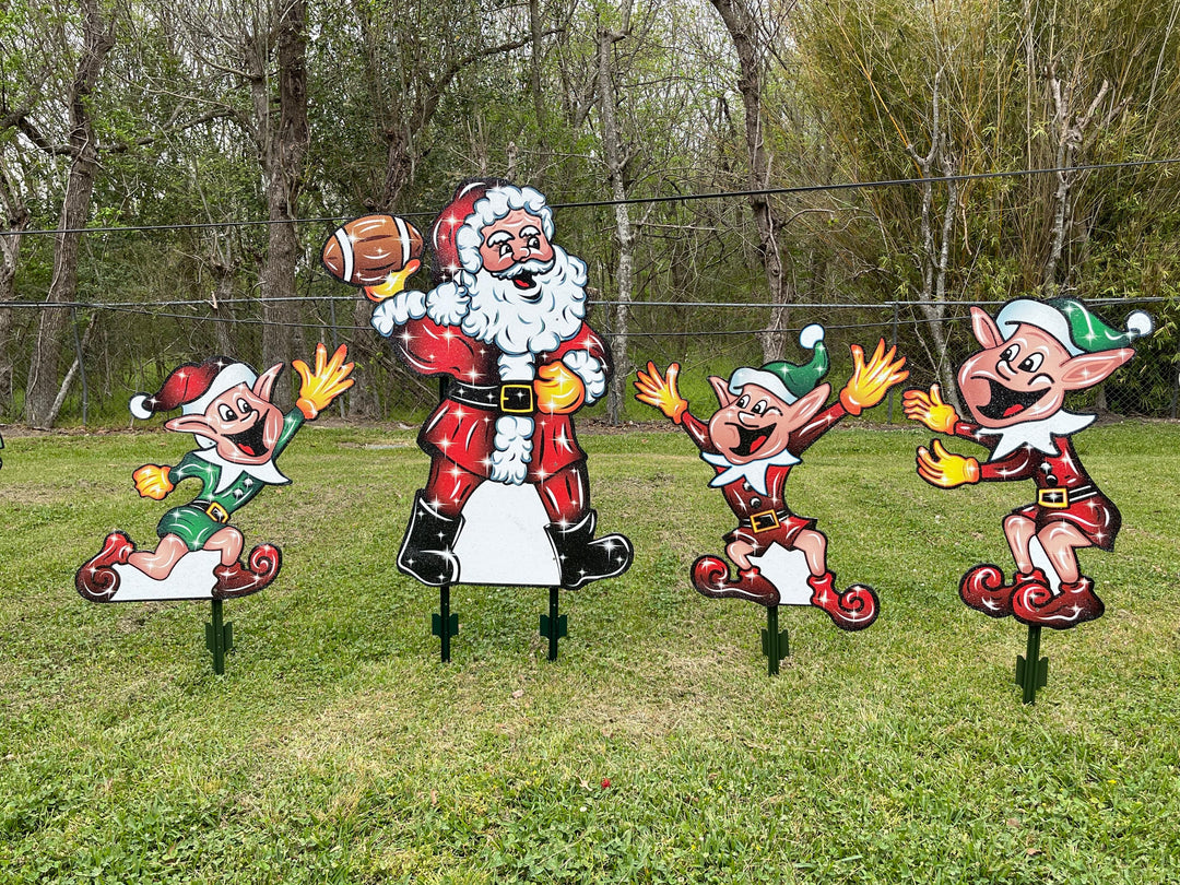 Santa Claus plays Football with Elves Yard Decoration