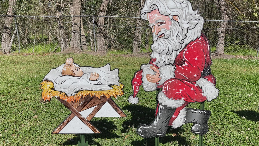 Christmas Yard Art Kneeling Santa with Baby Jesus in Manger