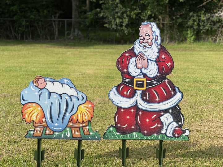 Praying Santa Christmas yard art