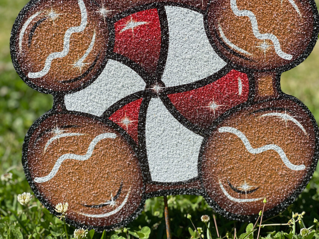 Christmas gingerbread kid with peppermint yard decor
