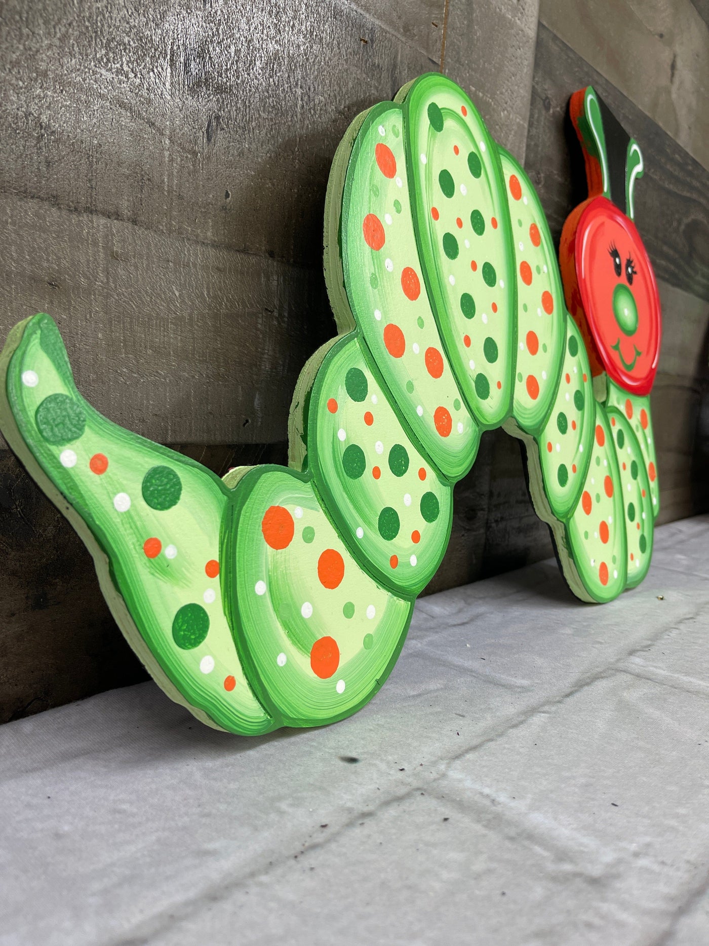 inch worm yard art decoration