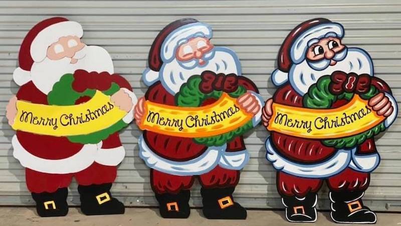 stages of merry christmas santa with wreath painted yard art design