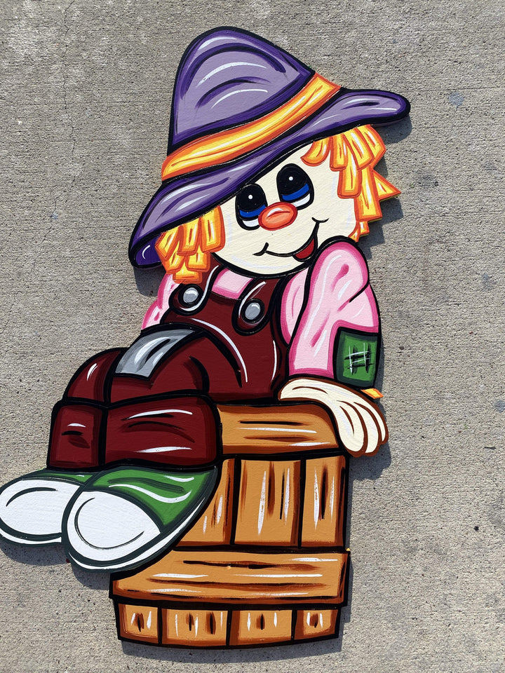 scarecrow on bucket painted yard art design