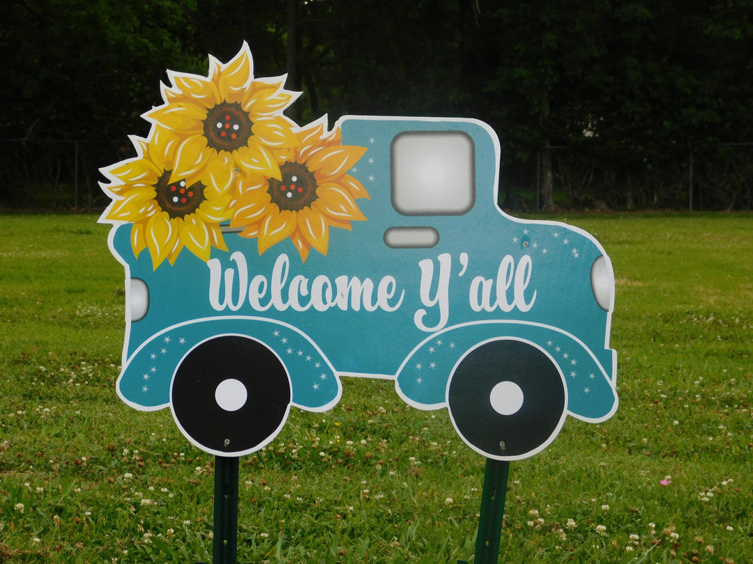 blue welcome yard art truck