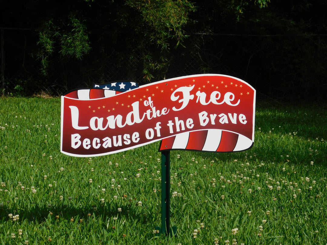 Land of the free yard art