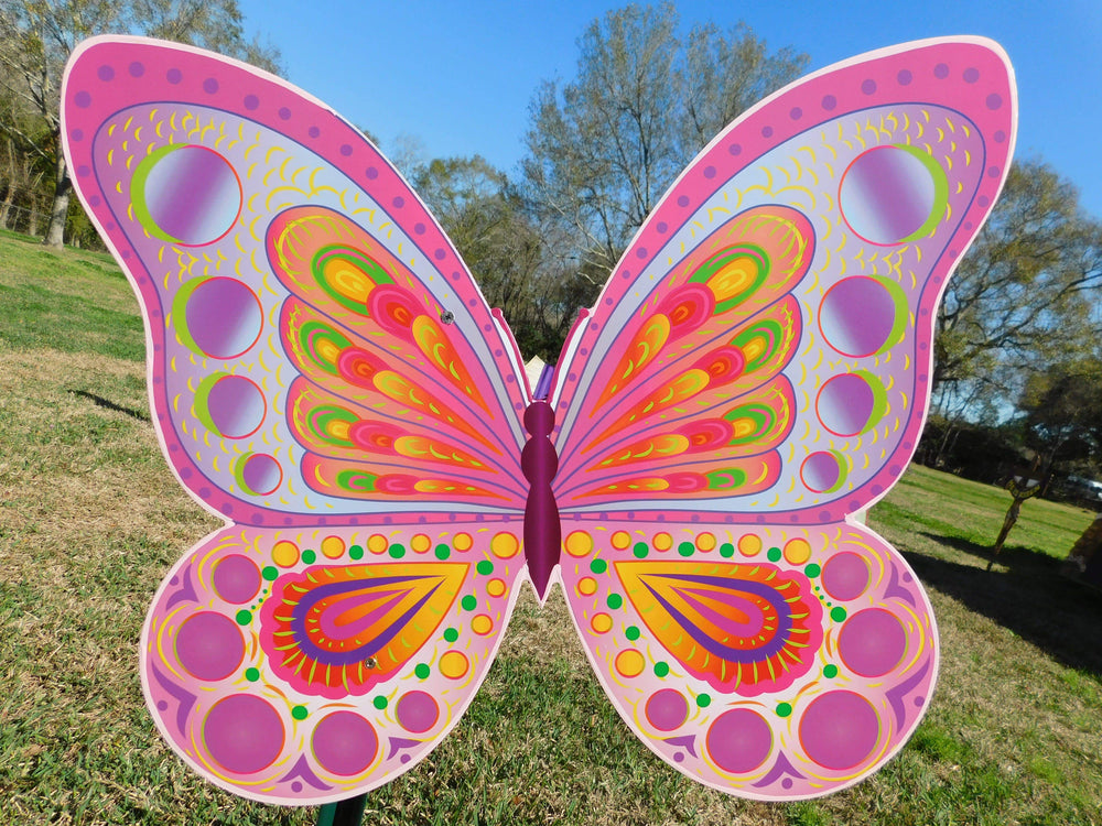 Large outdoor butterfly yard decoration sign in pink and purple. These animal yard signs come with stakes for easy mounting and placement. Decorate your outdoor space with beautiful, custom yard signs from Yard Art Decor and More. 
