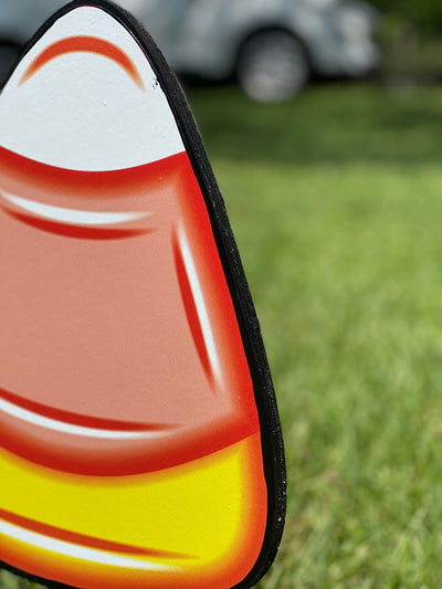candy corn painted yard art design