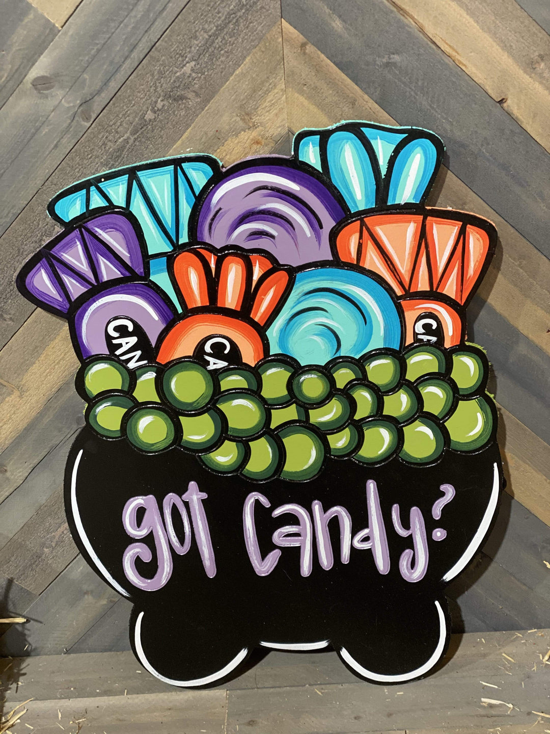 Got candy Cauldron painted yard art design