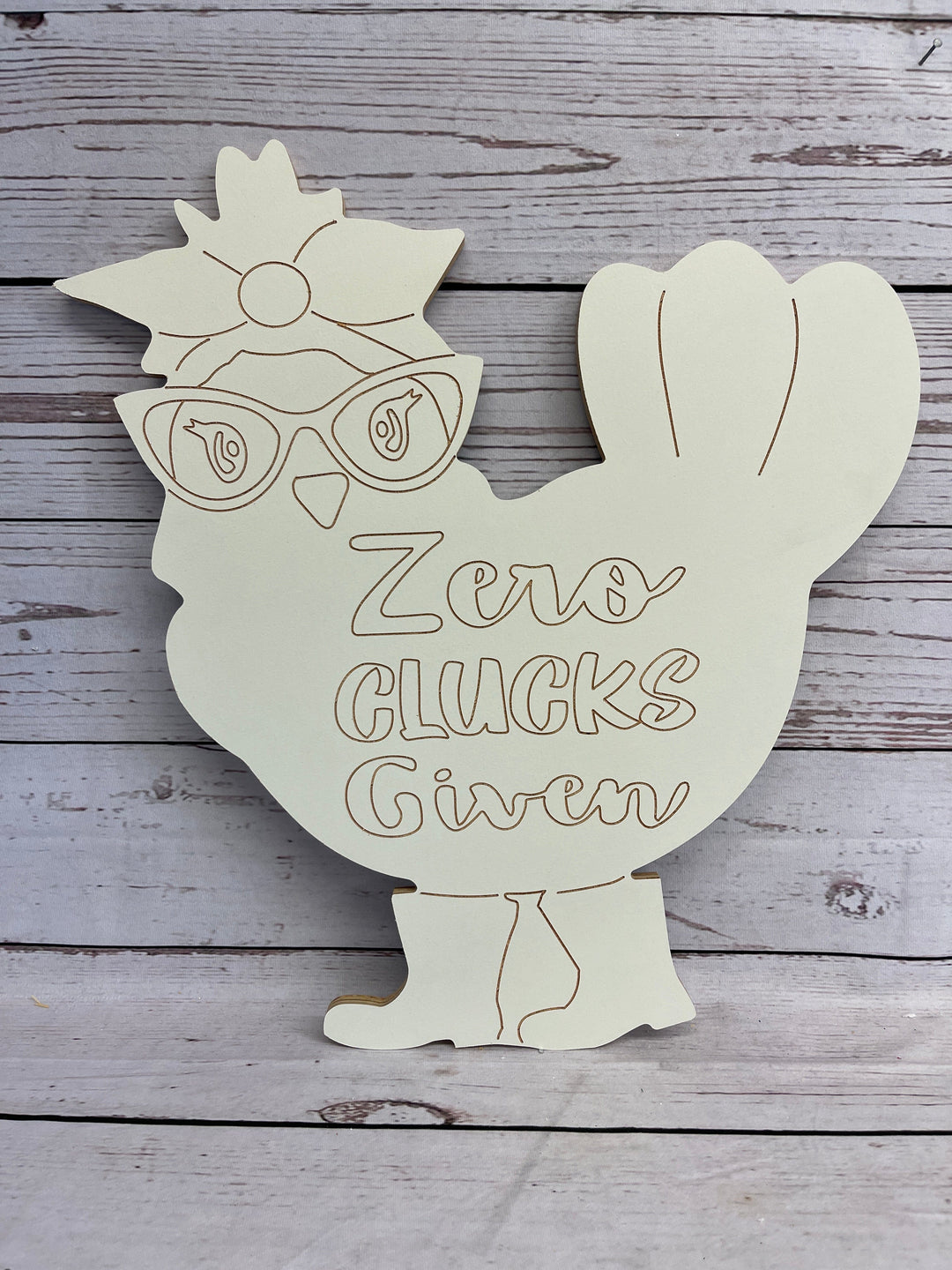 Zero Clucks Given chicken yard art 