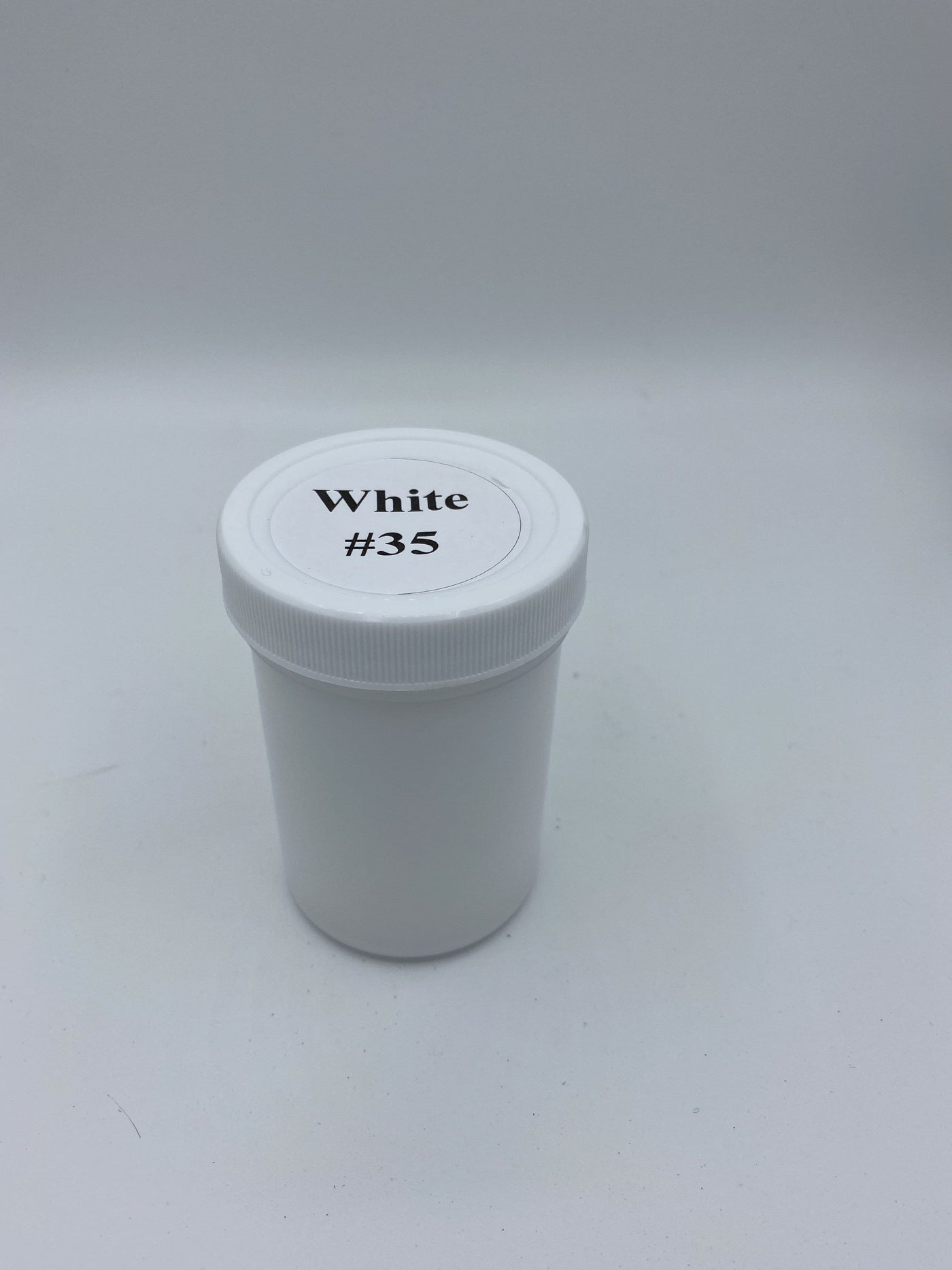 white exterior yard art paint
