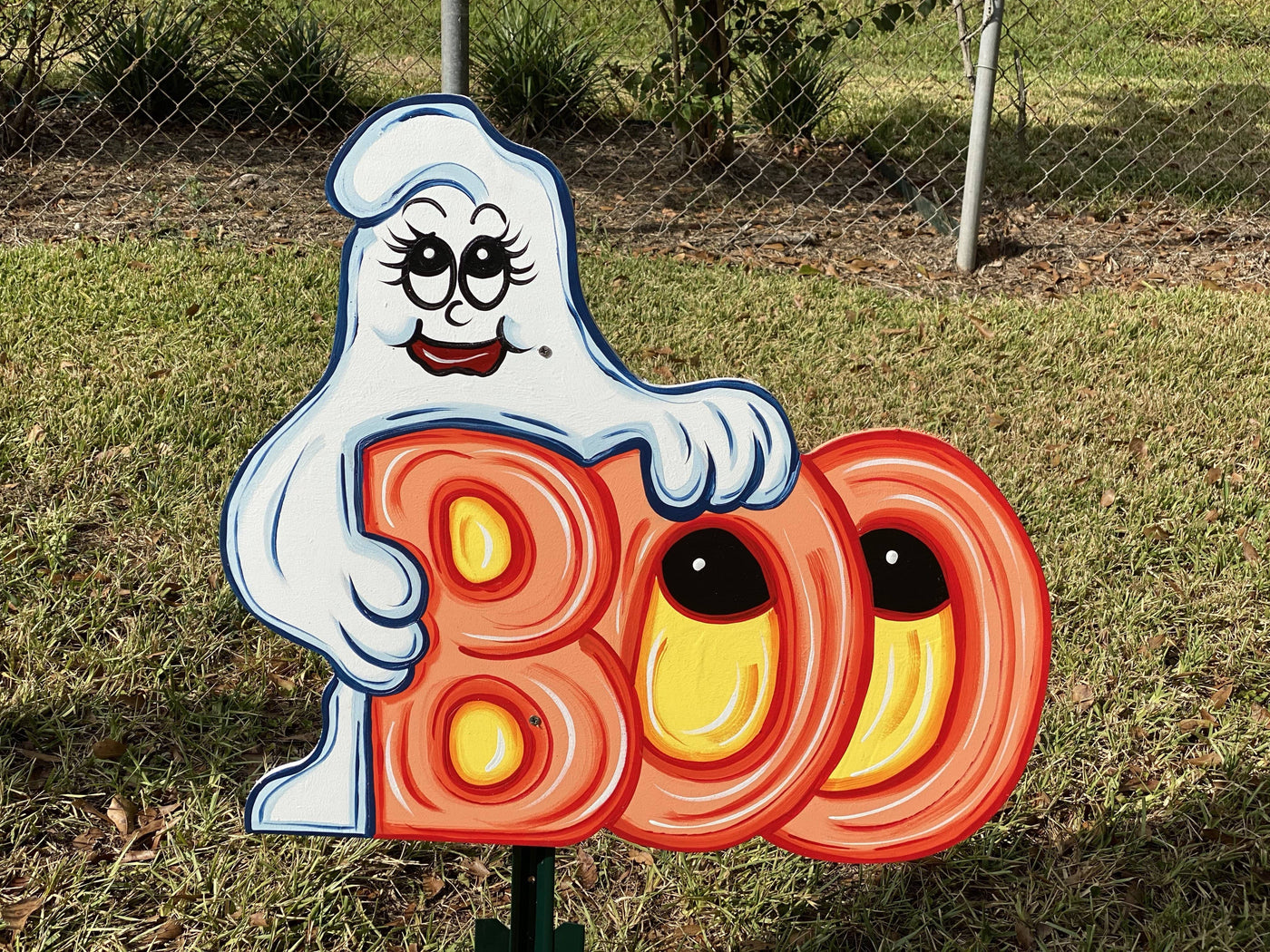 ghost holdong BOO letters with eyes painted yard art design