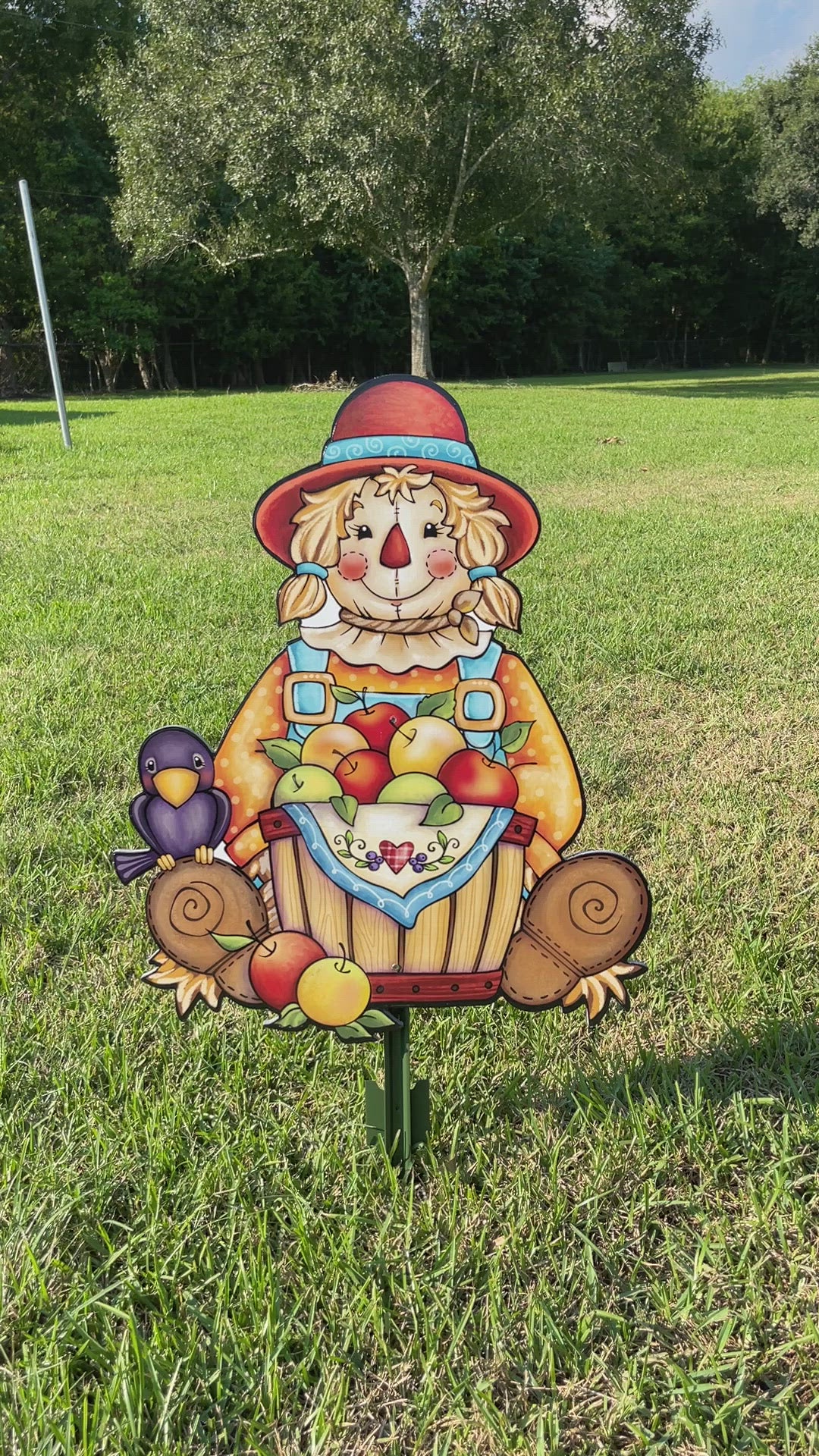 Scarecrow Sits with Apple Basket Fall Yard Art Decoration