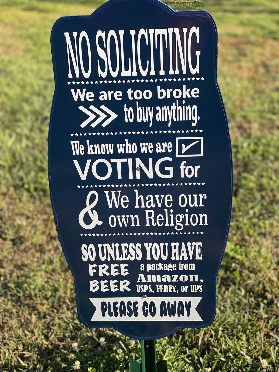 no soliciting yard art sign